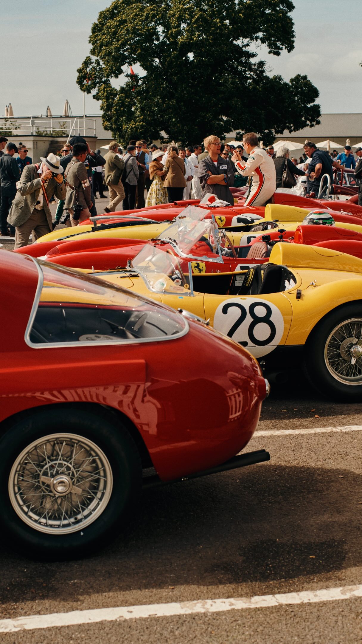 Promotional image from Ralph Lauren's 2026 Goodwood Revival motorsport festival partnership campaign.