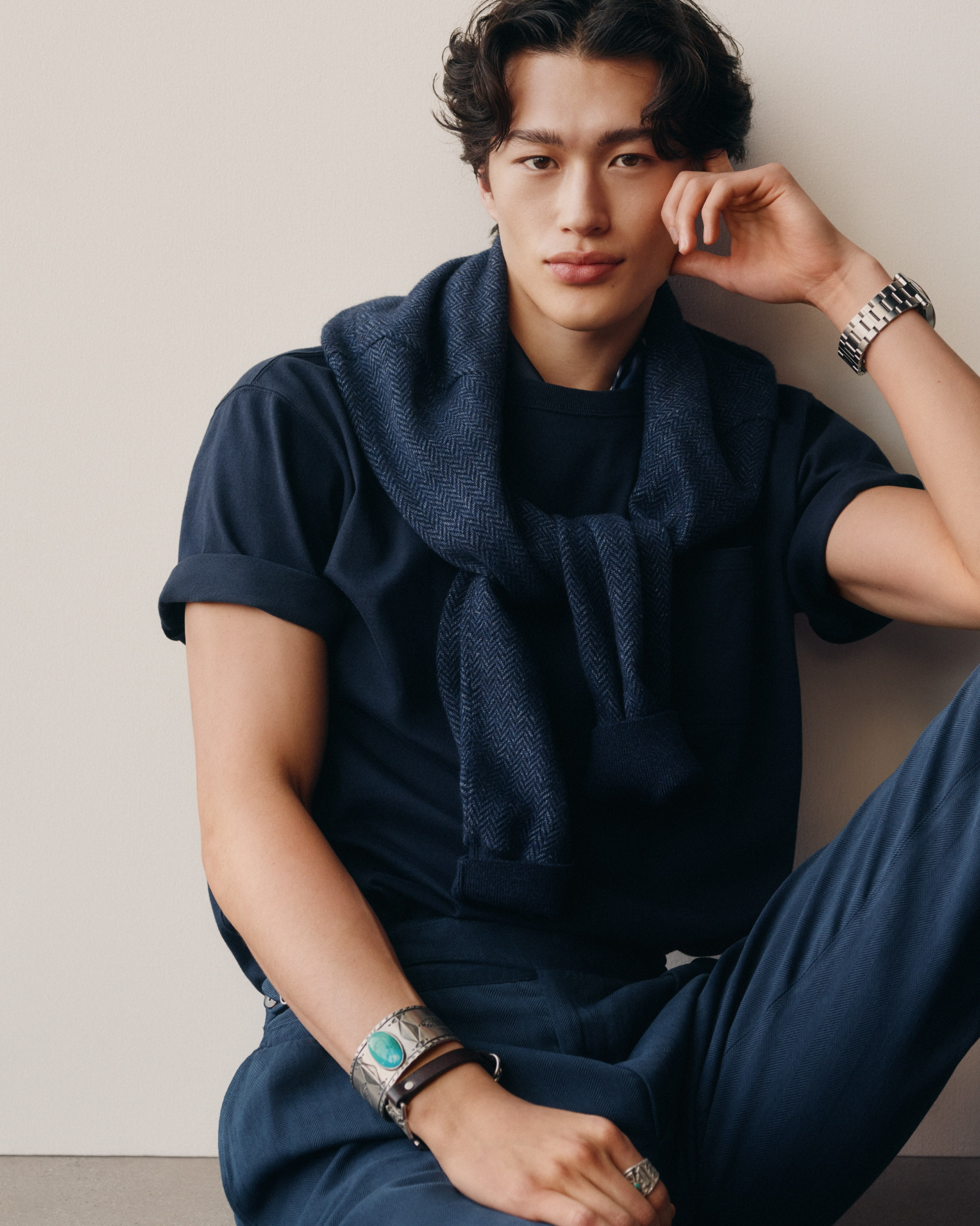 A look from Ralph Lauren Purple Label's Pre Fall 2026 collection styled with Neil Zarama's handmade silver jewelry.