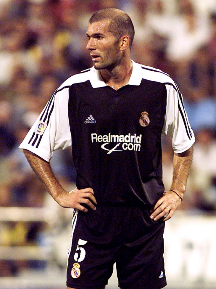 Zinedine Zidane pictured in a Real Madrid kit, marking the 25th anniversary of his August 2001 debut.