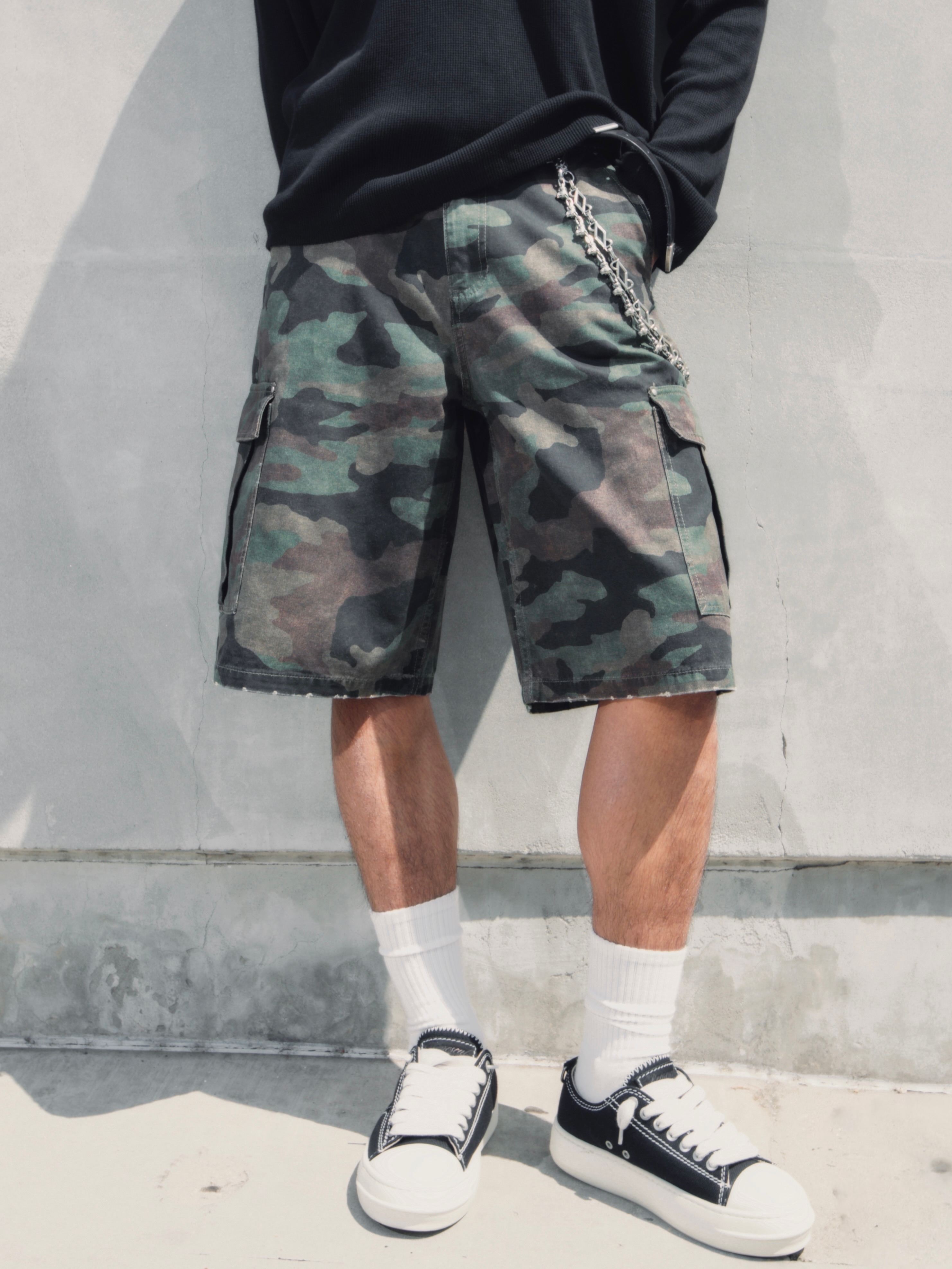 Represent's Camo Cargo Short, a woodland camouflage cotton canvas cargo short from the brand's Summer Capsule line.