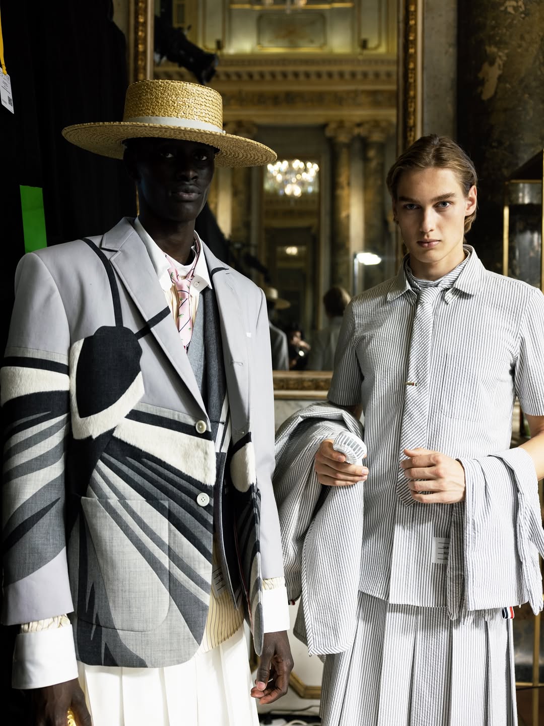 Thom Browne SS27 backstage in Milan, photographed by Eva Losada before the show, showing models and garments in preparation