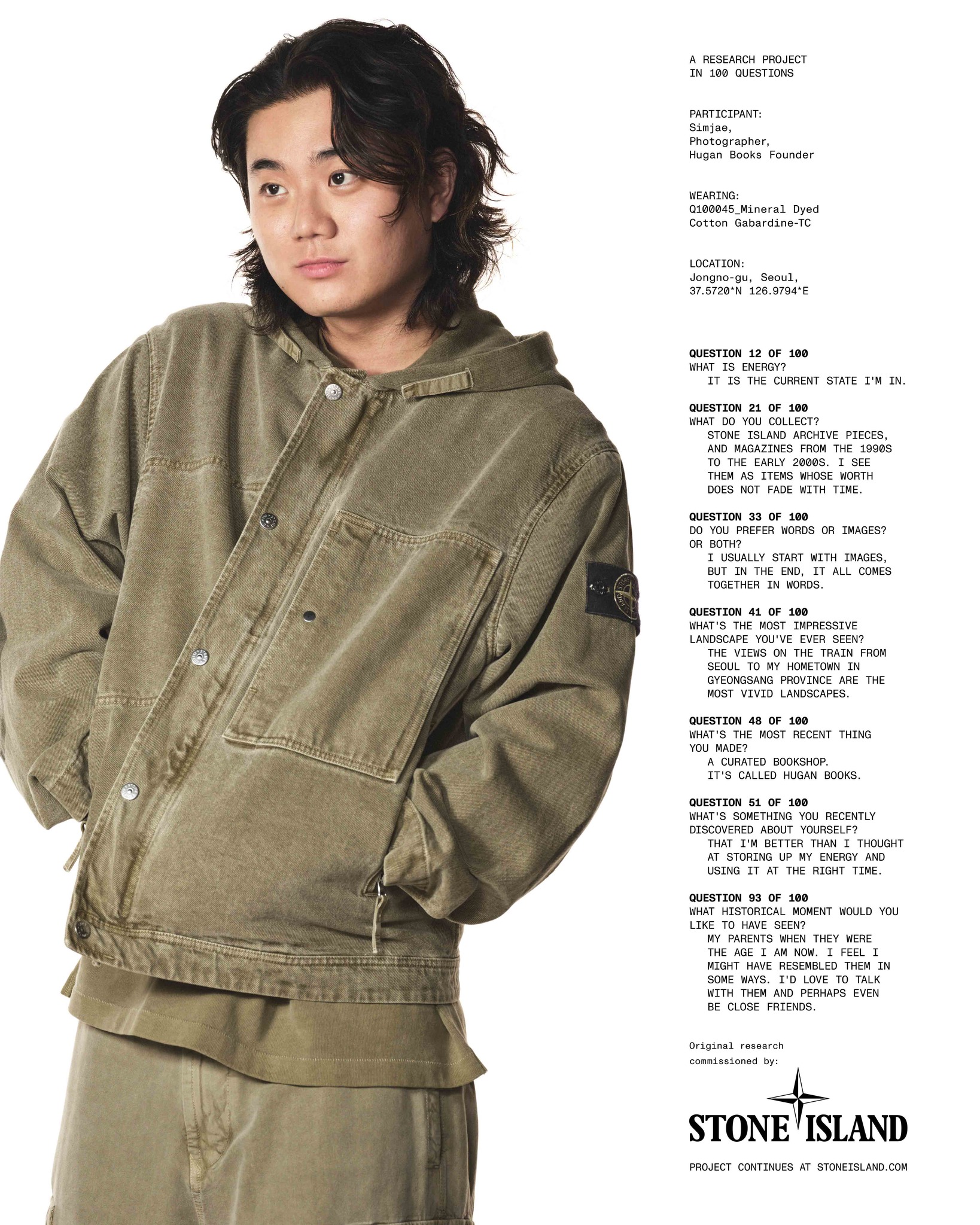 Photographer Simjae wearing Stone Island's Q100045 mineral dyed cotton gabardine hooded jacket for the Community as a Form of Research campaign.