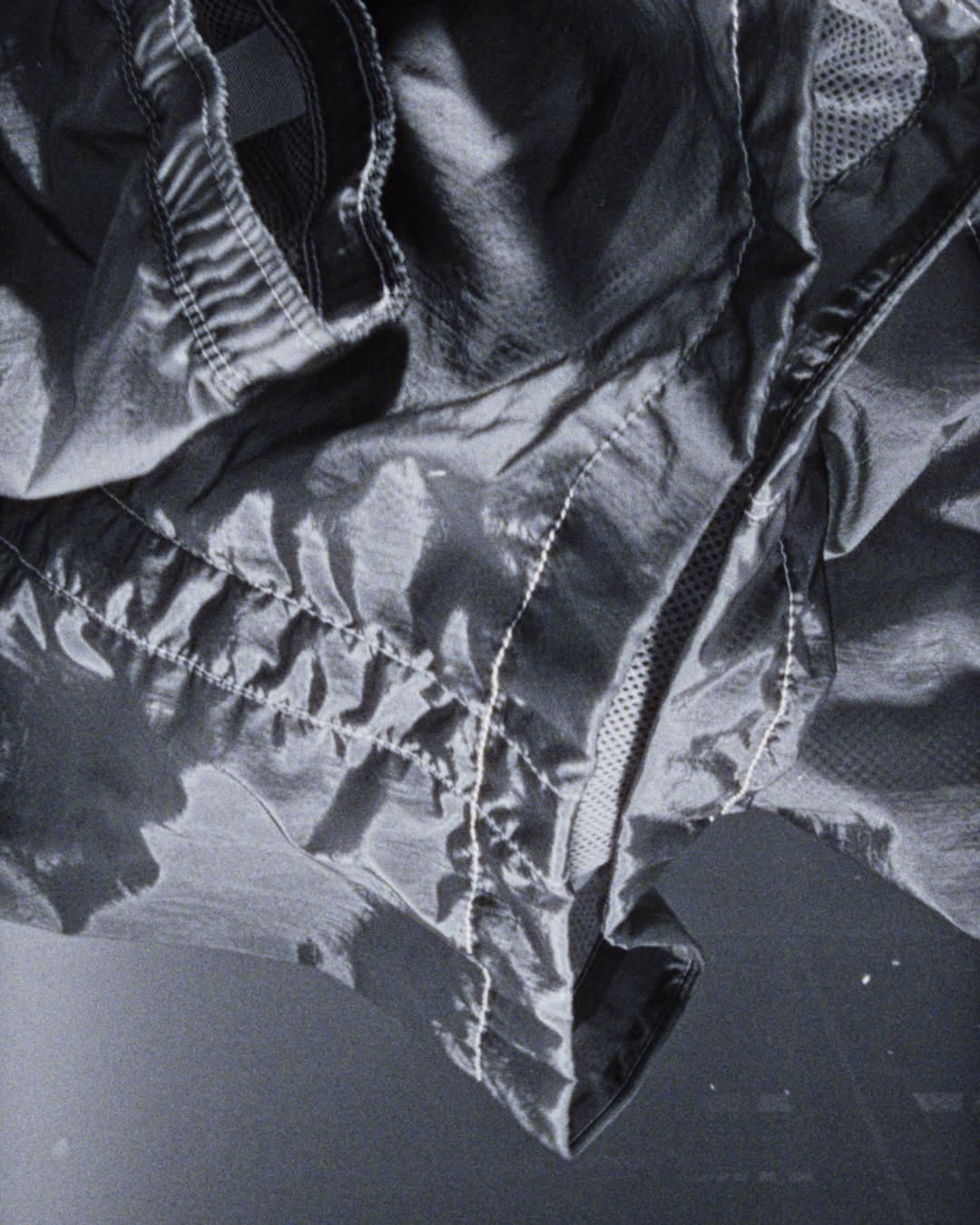 Stone Island Nylon Metal Is Not Metal. The Fabric Science Behind the Shimmer.