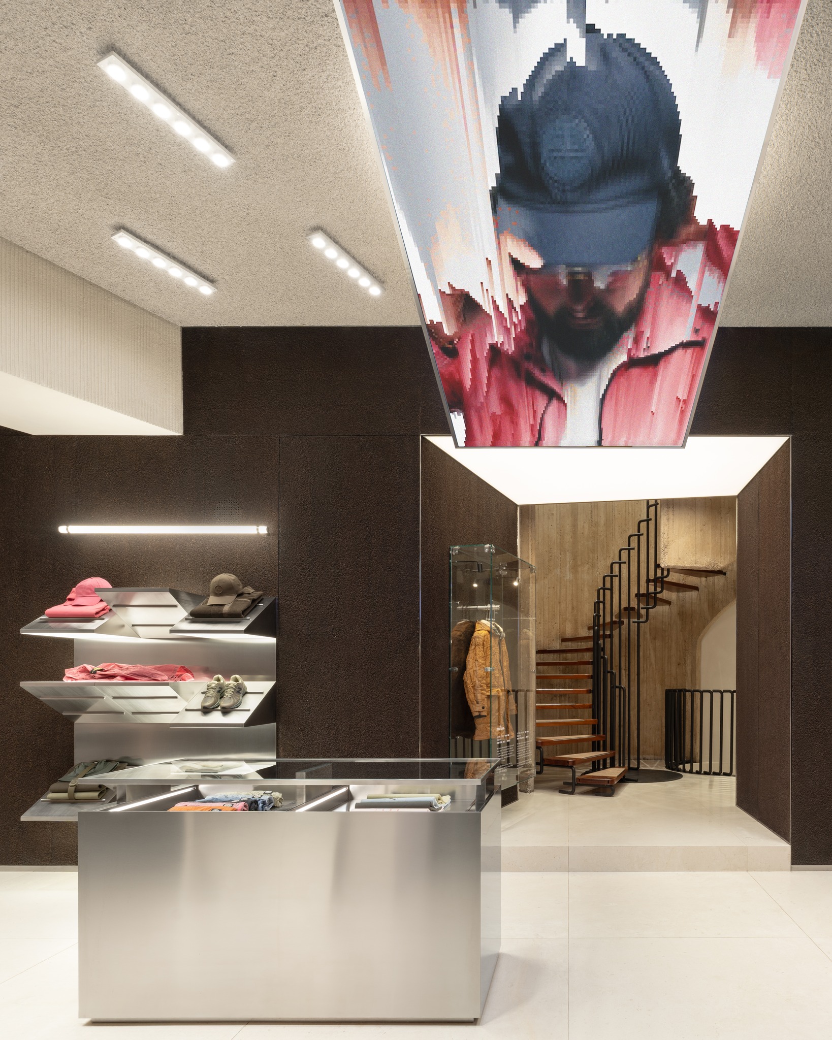 The Stone Island store interior on Via del Babuino in Rome, featuring the Hyperblock installation designed with OMA and AMO.