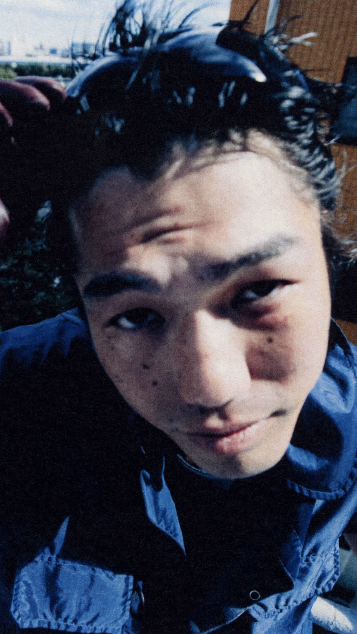 Seiya Amano in a blue garment in Stone Island's 'bout portrait.