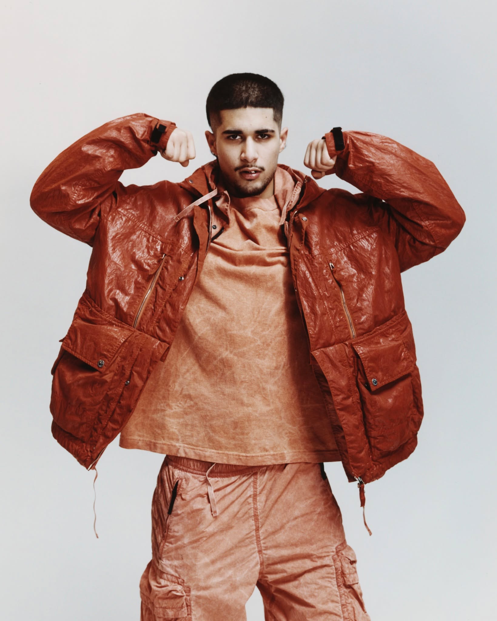 Fakemink wearing Stone Island's Q100027 Slick Nylon Tela TC jacket, photographed by Heikki Kaski.