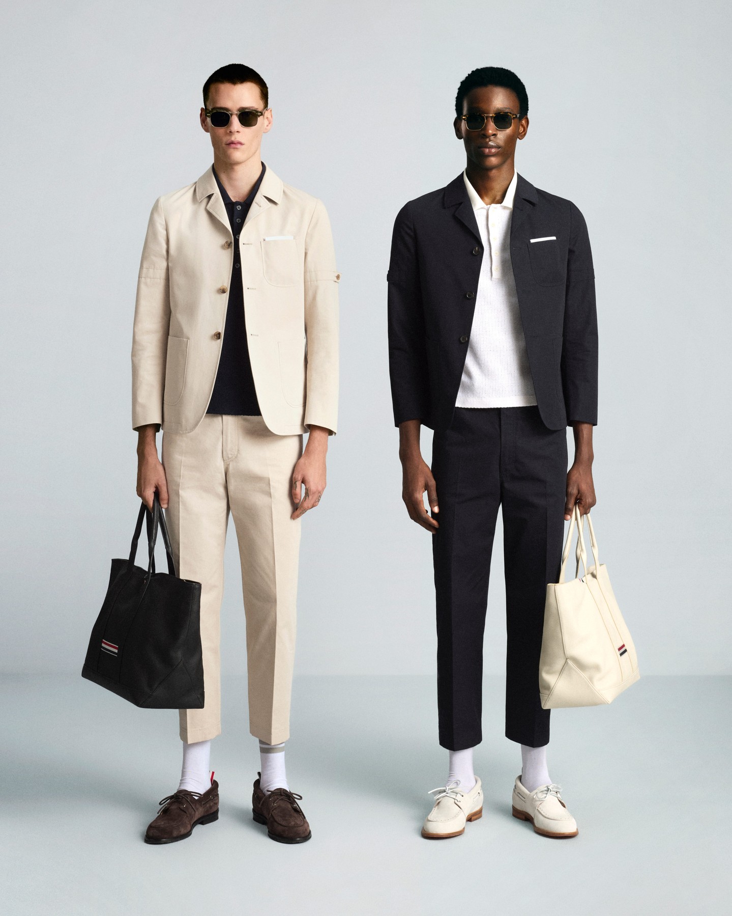 Thom Browne Fall 2026 unconstructed cotton poplin button up shirt with grosgrain armband detailing.