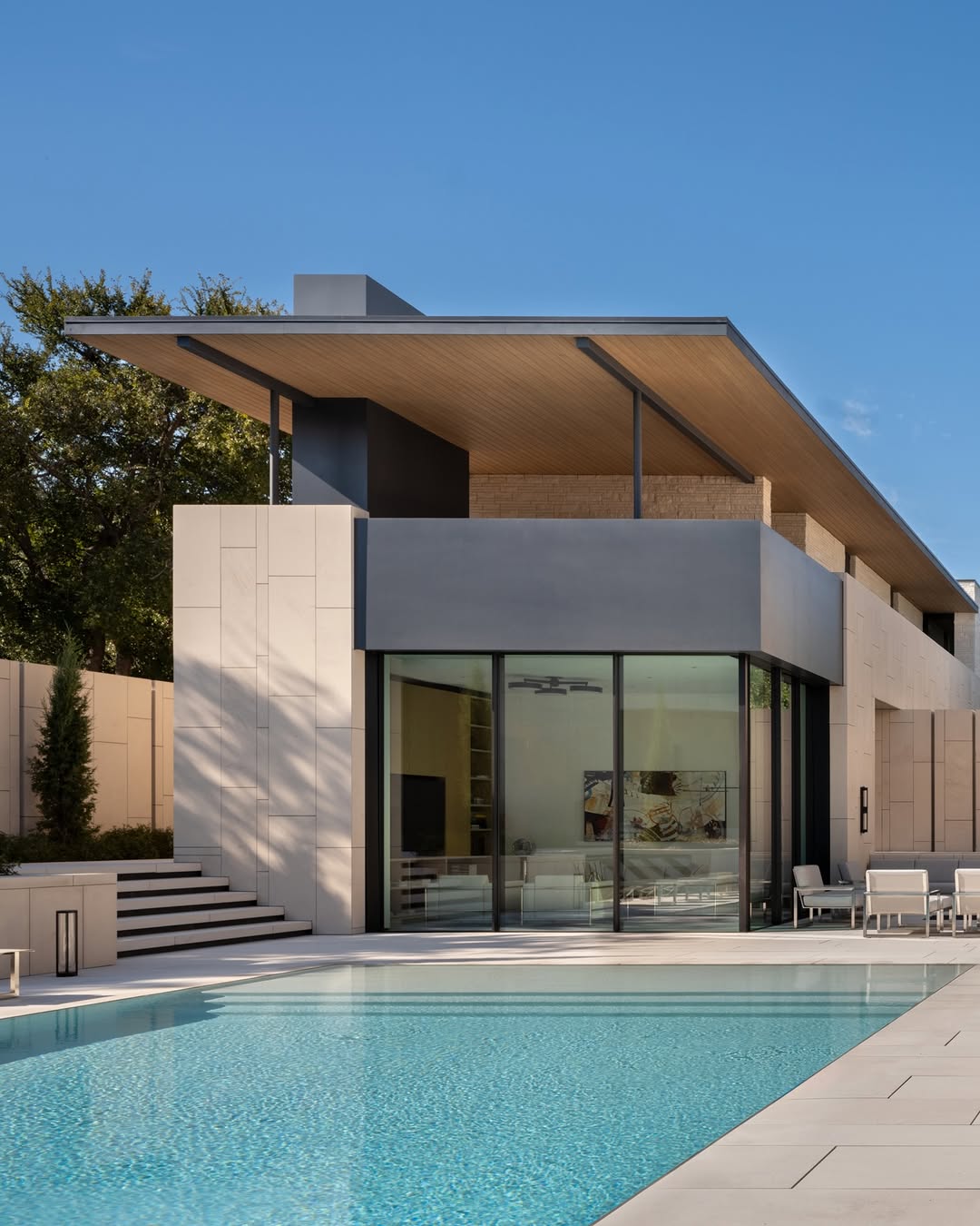 OCTANT HOUSE BY MF ARCHITECTURE MAKES THE GARAGE THE CENTRAL SPACE (image 3)
