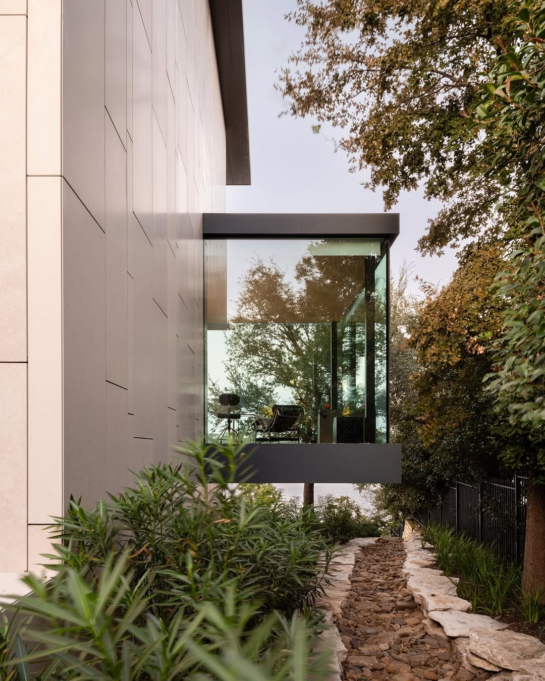 OCTANT HOUSE BY MF ARCHITECTURE MAKES THE GARAGE THE CENTRAL SPACE (image 5)