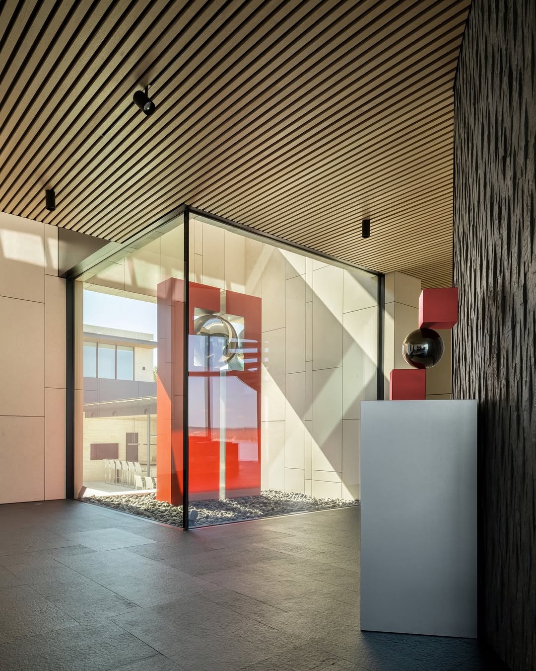 OCTANT HOUSE BY MF ARCHITECTURE MAKES THE GARAGE THE CENTRAL SPACE (image 6)
