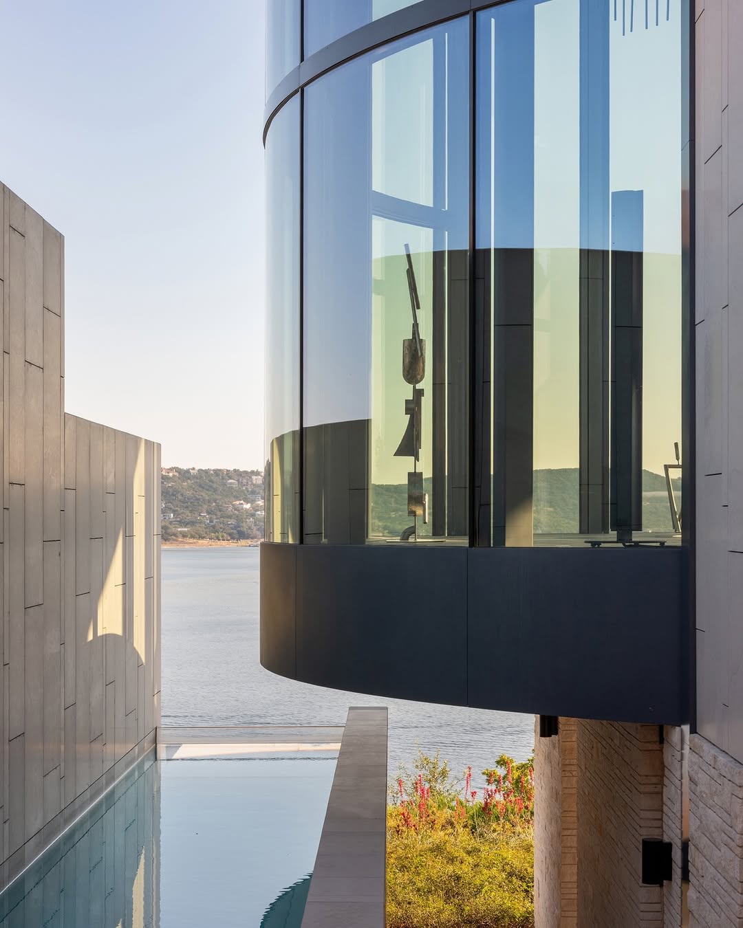 OCTANT HOUSE BY MF ARCHITECTURE MAKES THE GARAGE THE CENTRAL SPACE (image 7)