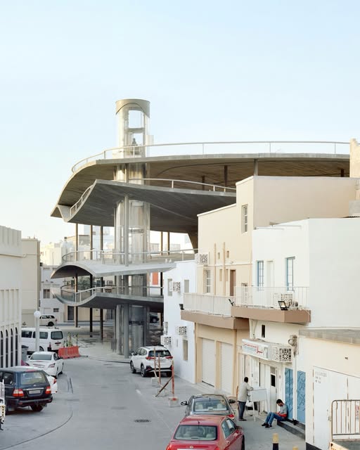 Sloping concrete ramps of Christian Kerez's multi level car park in Muharraq, Bahrain.