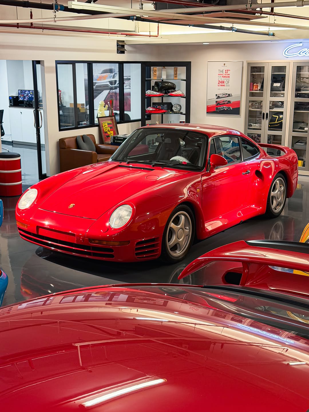 Rare Porsche models including the 959 Sport parked inside a private collection in Bangkok, Thailand.