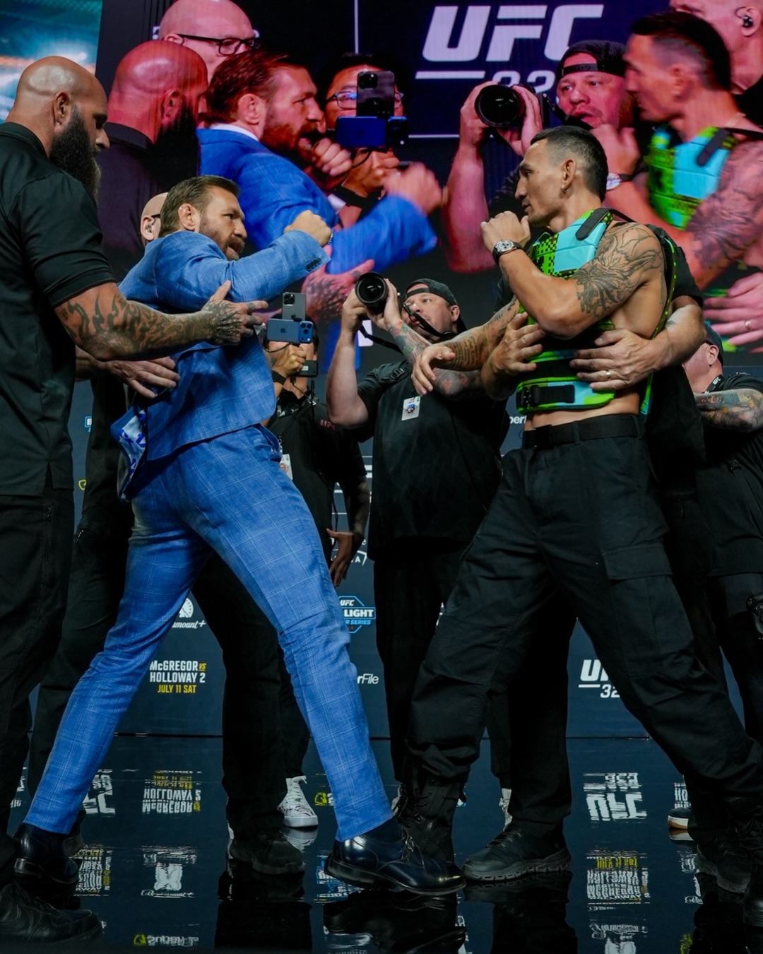 Conor McGregor and Max Holloway promotional image for UFC 329 at T Mobile Arena