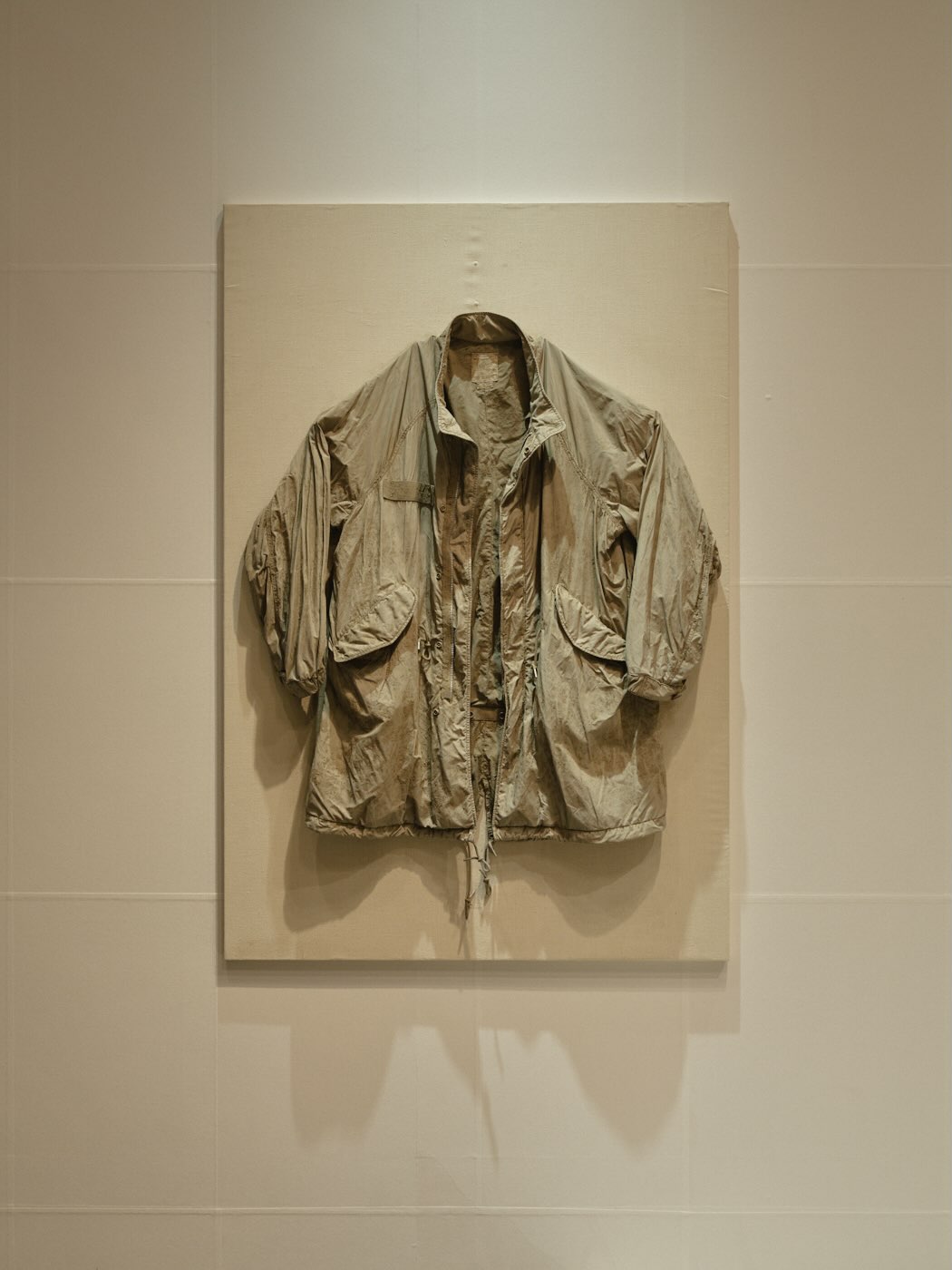 Visvim garments and natural dye materials staged for the Harmonious Process 2026 exhibition at Isetan Shinjuku.
