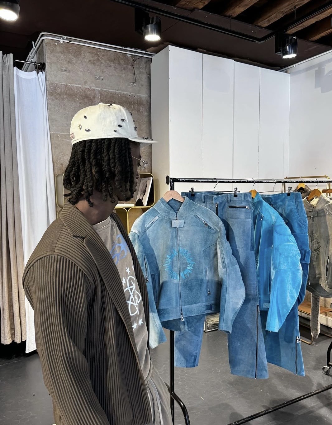 KITH'S TEAL MOTO MOMENT SPARKS COPY CONTROVERSY (image 2)