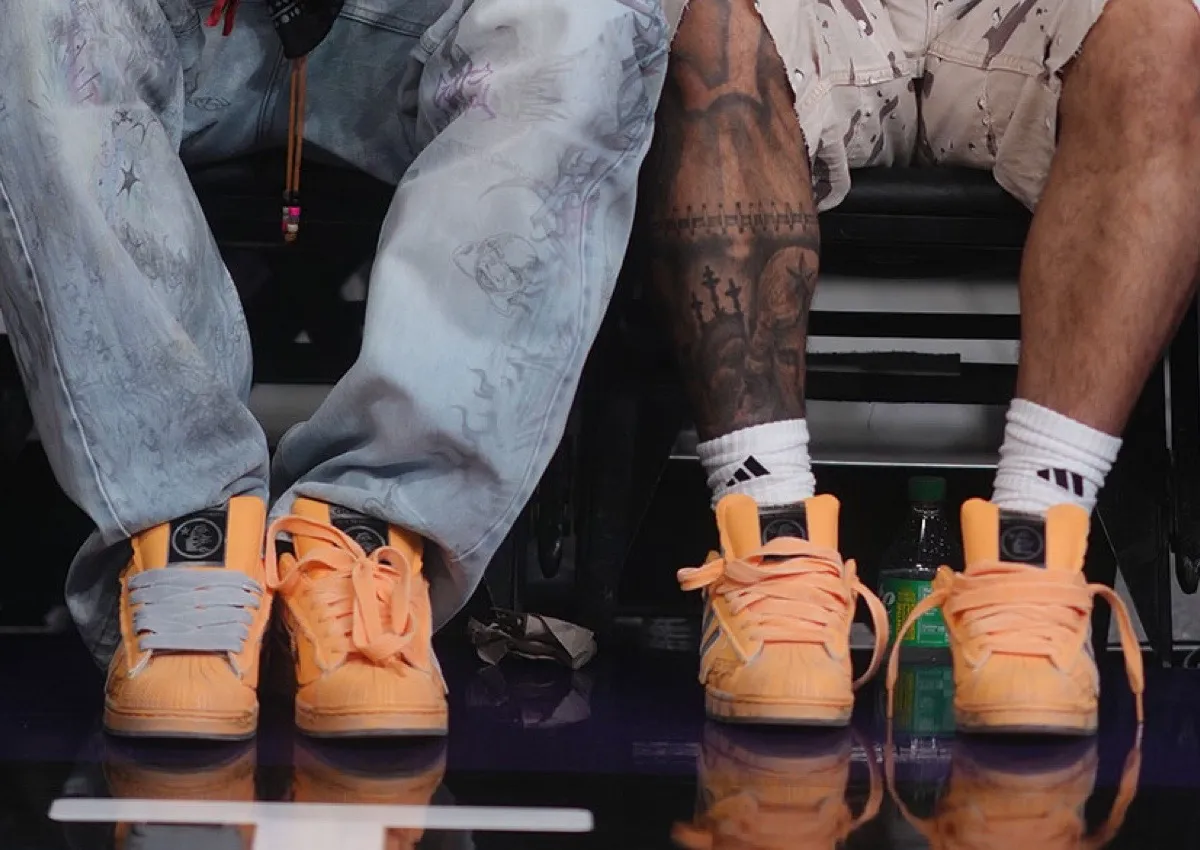 HELLSTAR DEBUTS ORANGE ADIDAS SUPERSTAR AT LAKERS GAME