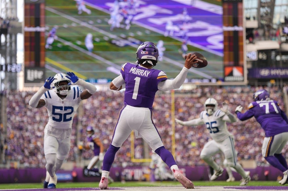 Vikings quarterback Kyler Murray throws against the Indianapolis Colts at U.S. Bank Stadium