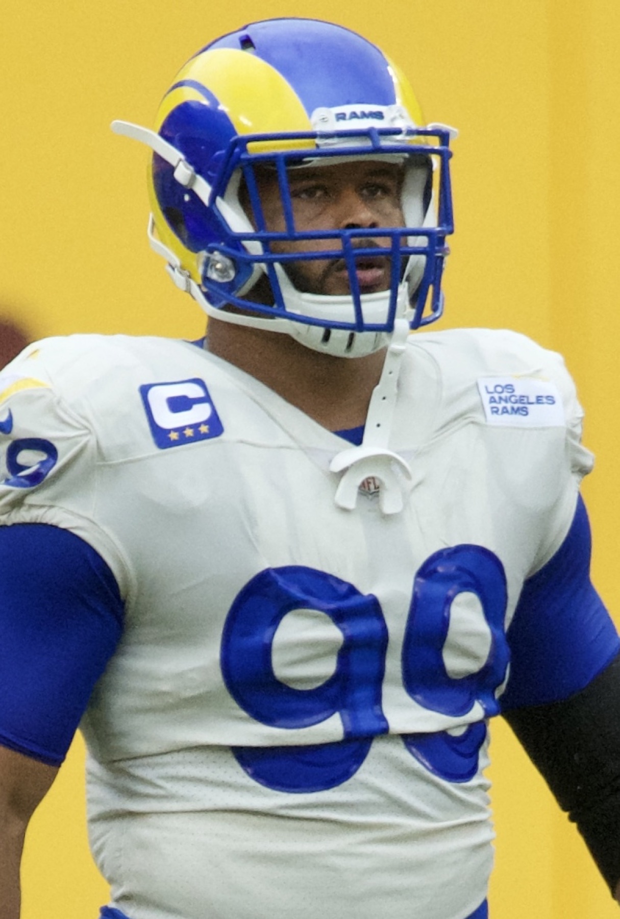 Aaron Donald in a Los Angeles Rams jersey and helmet on the sideline