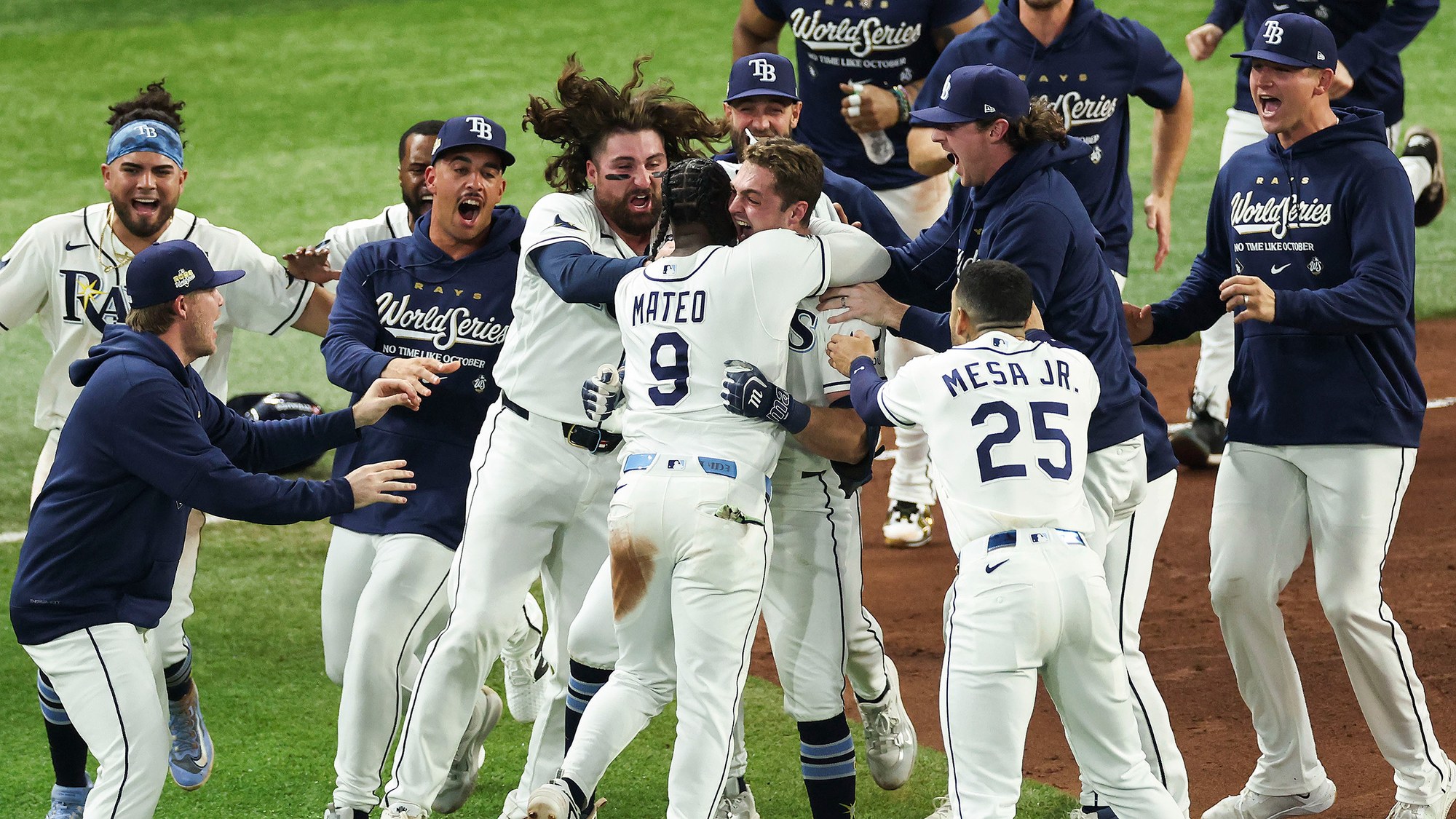Tampa Bay Rays players celebrate on the field after their 12th inning walk off win over the Brewers in Game 4 of the 2026 World Series